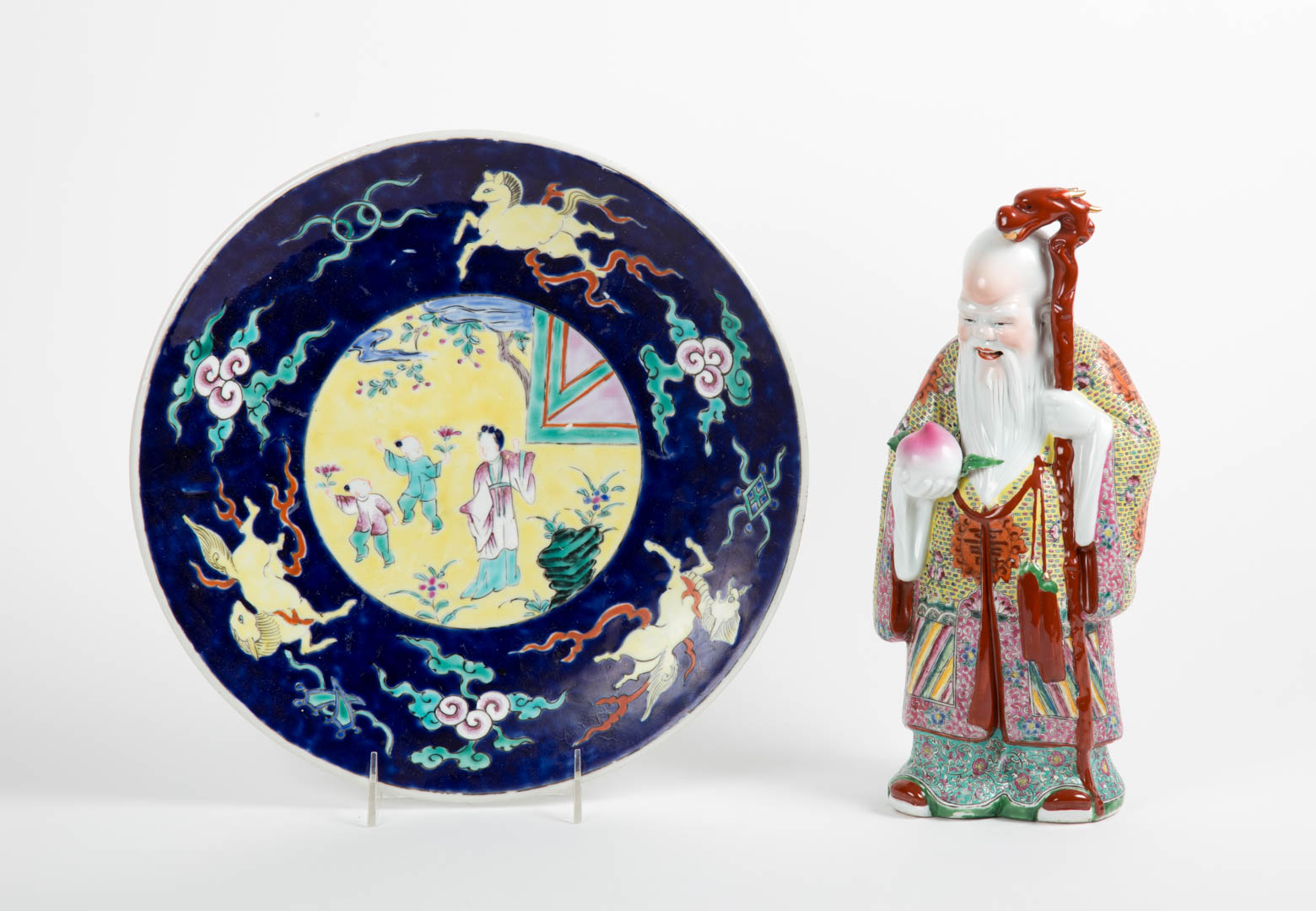 Appraisal: Chinese Export Famille Rose figure and charger figure of immortal