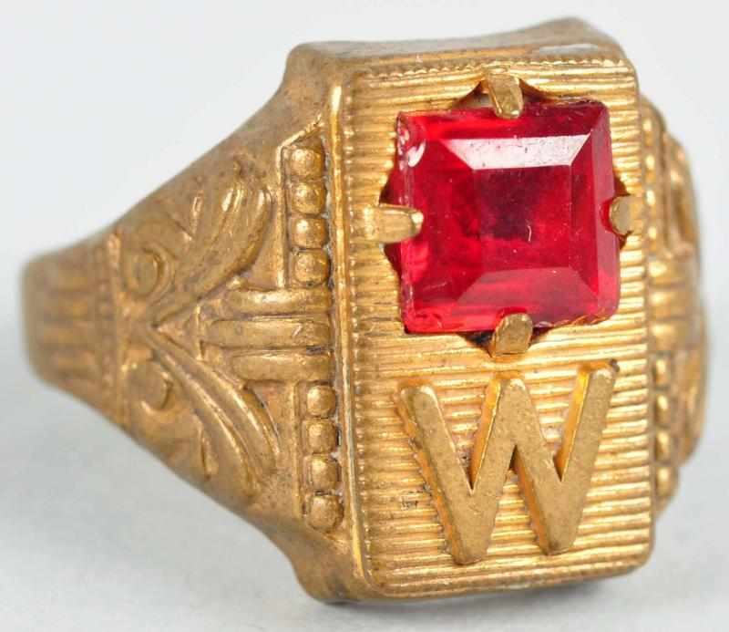 Appraisal: Vintage Buck Rogers Initial Ring with Red Stone Description Birthstone