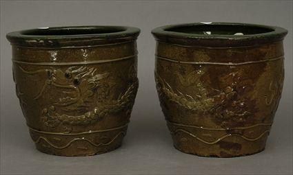 Appraisal: Pair of Modern Chinese Brown-Glazed Ceramic Jardinieres with Relief Decoration