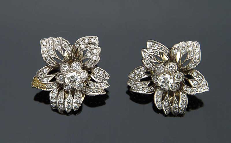 Appraisal: PAIR OF PLATINUM AND DIAMOND CLIP EARRINGS Platinum floral motif