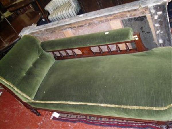 Appraisal: A Victorian mahogany framed velvet upholstered chaise longue on turned