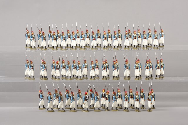 Appraisal: A similar lot of metal figures representing French Turcos marching