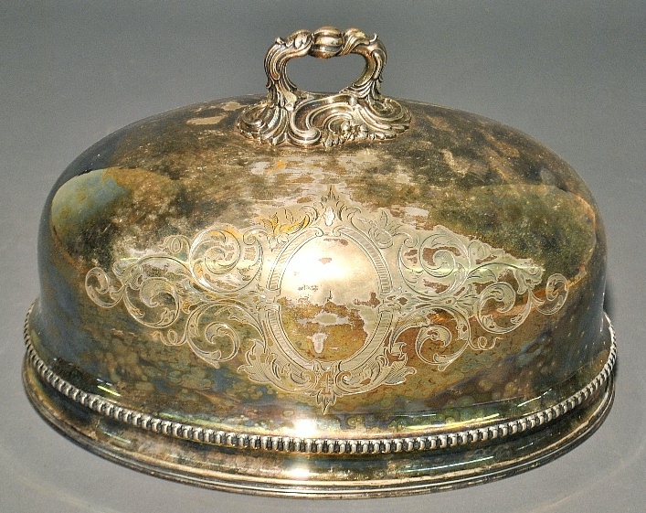 Appraisal: - Oval Sheffield meat dome th c with ornate chased