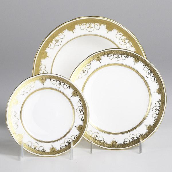 Appraisal: MINTONS FOR TIFFANY CO Gilt decorated porcelain dinnerware Thirty-nine pieces