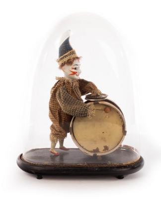 Appraisal: A mid th Century French walking Polichinelle clown automaton beating