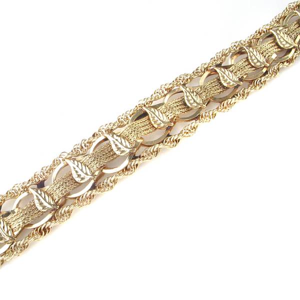 Appraisal: A k gold charm bracelet Length in grams