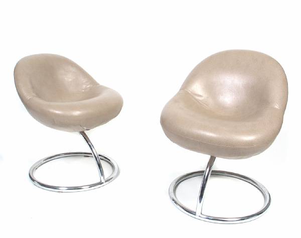 Appraisal: A set of four contemporary chrome and faux ostrich upholstered