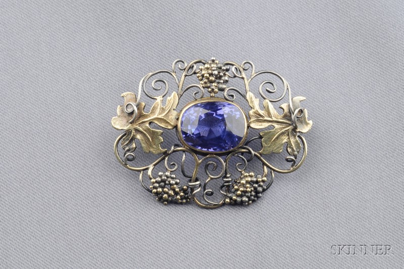 Appraisal: Arts Crafts Purple Sapphire Brooch bezel-set with a cushion-cut sapphire