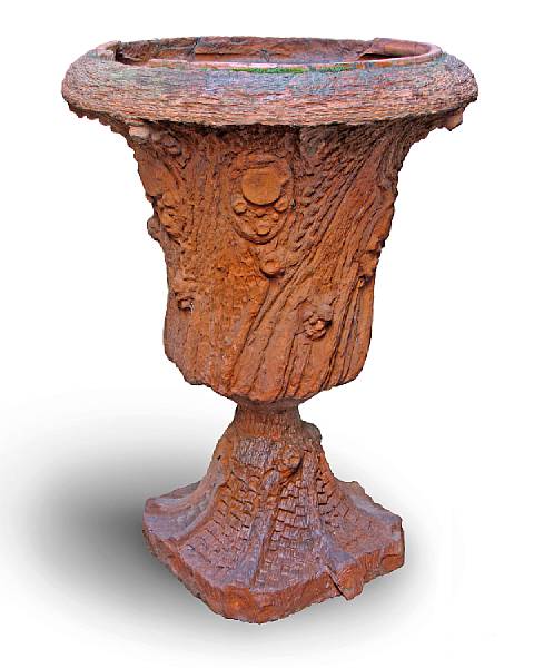 Appraisal: A Victorian terra cotta tree trunk form urn on pedestal