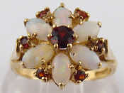 Appraisal: A carat gold opal and garnet ring head approx cm