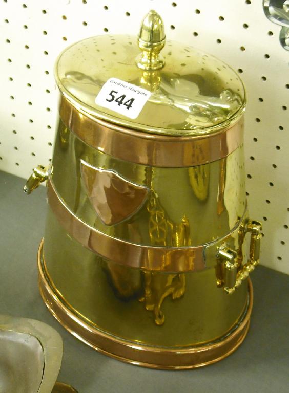 Appraisal: Scottish brass and copper oval tapering biscuit tin and cover