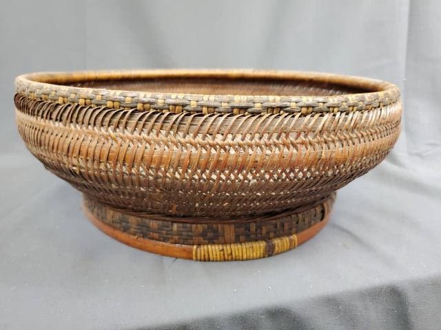 Appraisal: Antique th century Chinese grain basket measuring inches in diameter