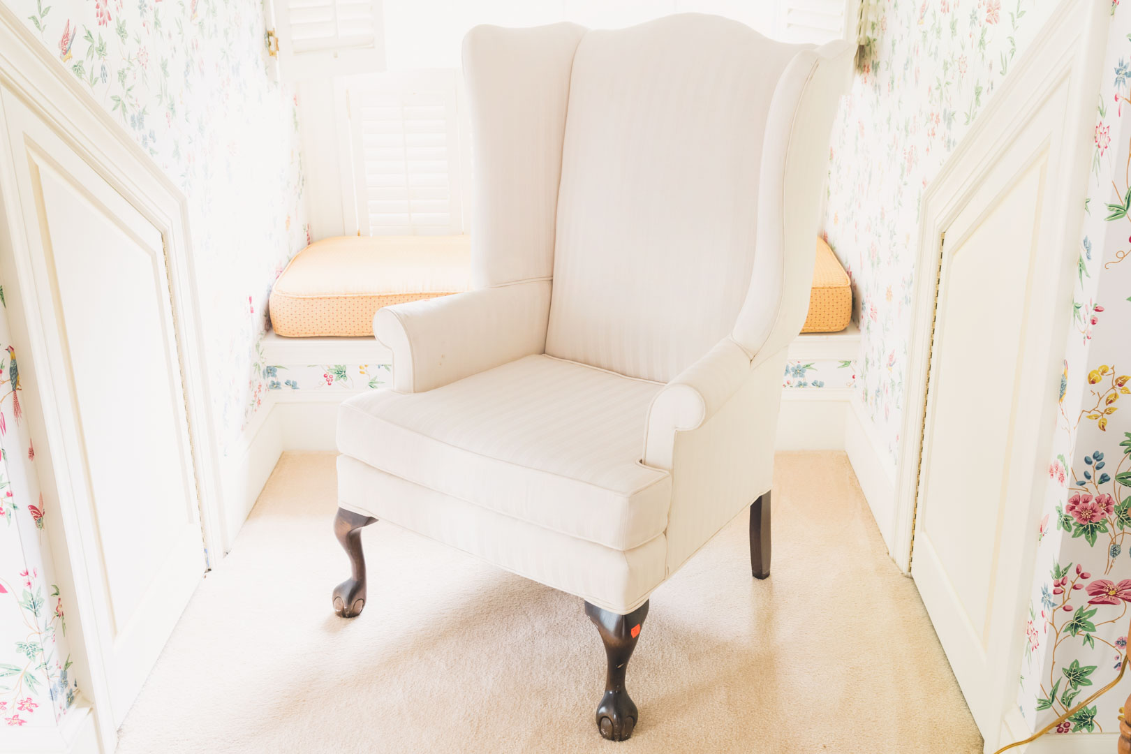 Appraisal: Chippendale style upholstered wing chair with ball and claw feet