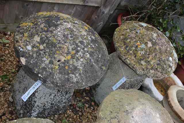 Appraisal: A PAIR OFCOTSWOLD LIMESTONE STADDLESTONES with circular lichen covered tops