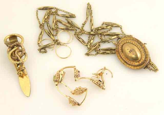 Appraisal: A Victorian ct gold brooch of domed oval form a