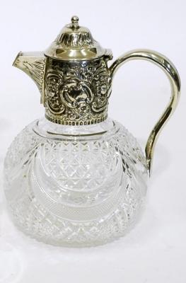 Appraisal: A VICTORIAN CUT GLASS CLARET JUG of bulbous form with