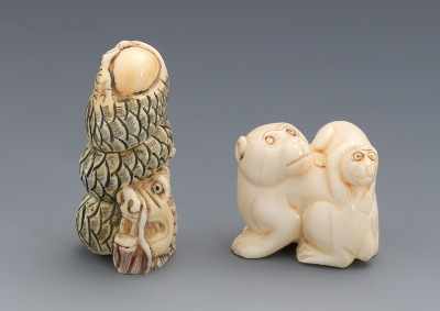 Appraisal: Two Carved Ivory Netsuke The first a monkey with young