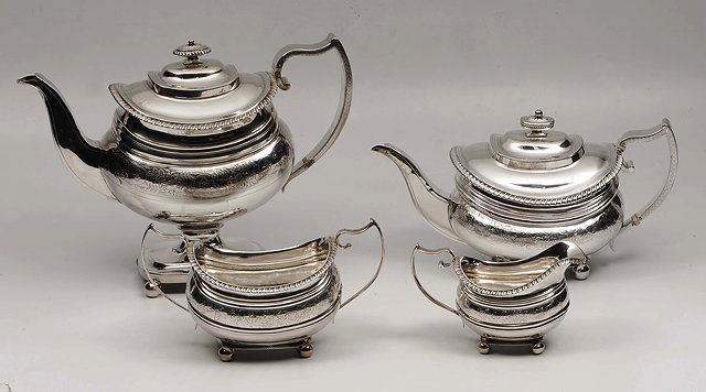 Appraisal: A GEORGE III SILVER FOUR PIECE TEA SET with two