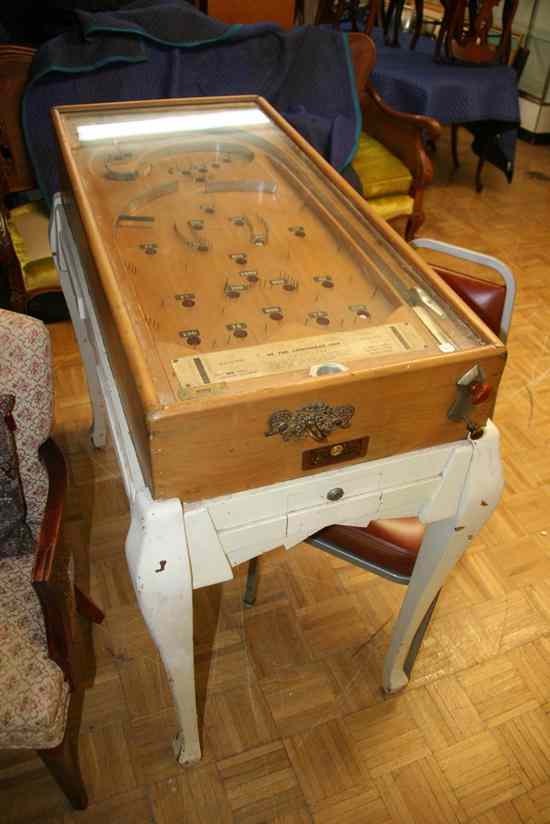 Appraisal: SPRING-ACTION MECHANICAL PINBALL MACHINE mid th century Marked ''Pioneer Novelty