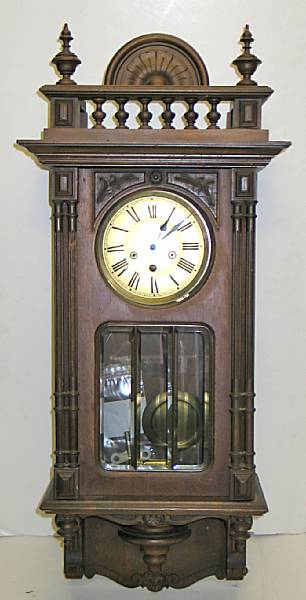 Appraisal: A German walnut Westminister chime wall clock late th early