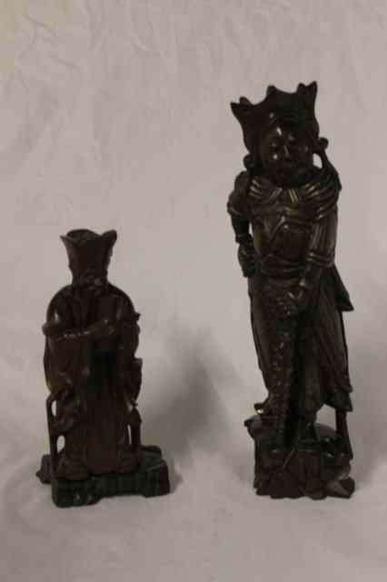 Appraisal: A CHINESE CARVED WOOD SCHOLAR on a hardwood stand high