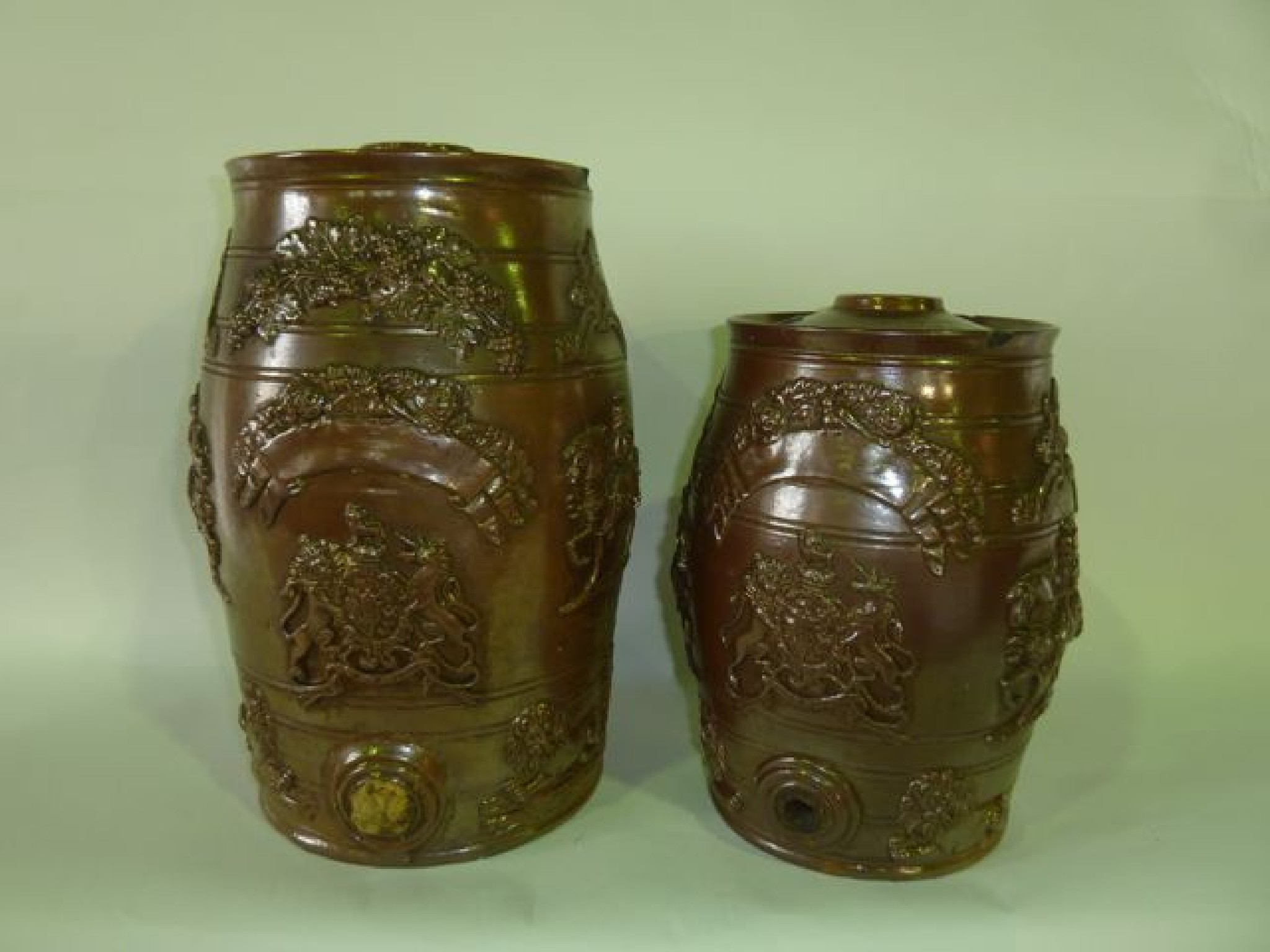 Appraisal: Two th century graduated stoneware barrels with dark brown salt