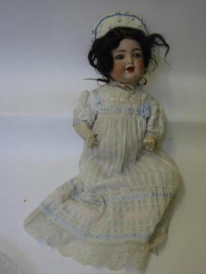 Appraisal: A Kammer Reinhardt bisque head character doll with blue sleeping