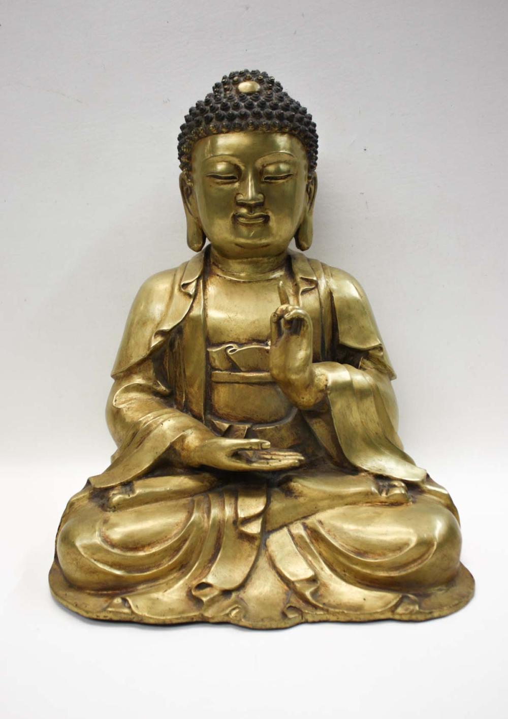 Appraisal: CHINESE GILT BRONZE BUDDHA SCULPTURE depicting a seated Buddha with