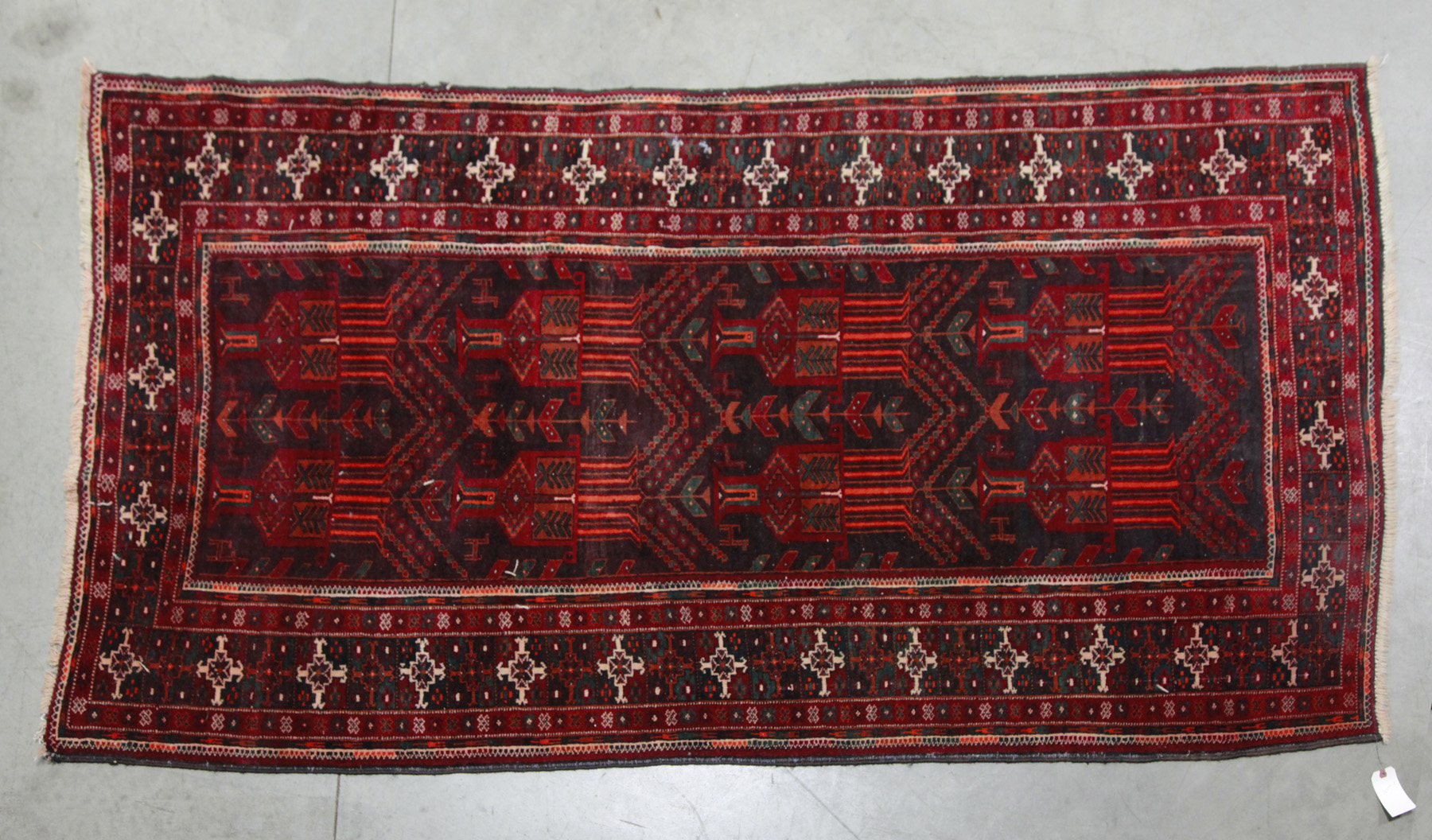 Appraisal: ORIENTAL AREA RUG Second half- th century Geometric patterns in