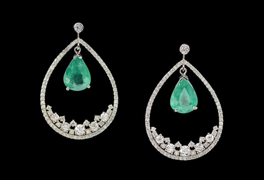 Appraisal: K CTW EMERALD AND DIAMOND EARRINGS K white gold earrings