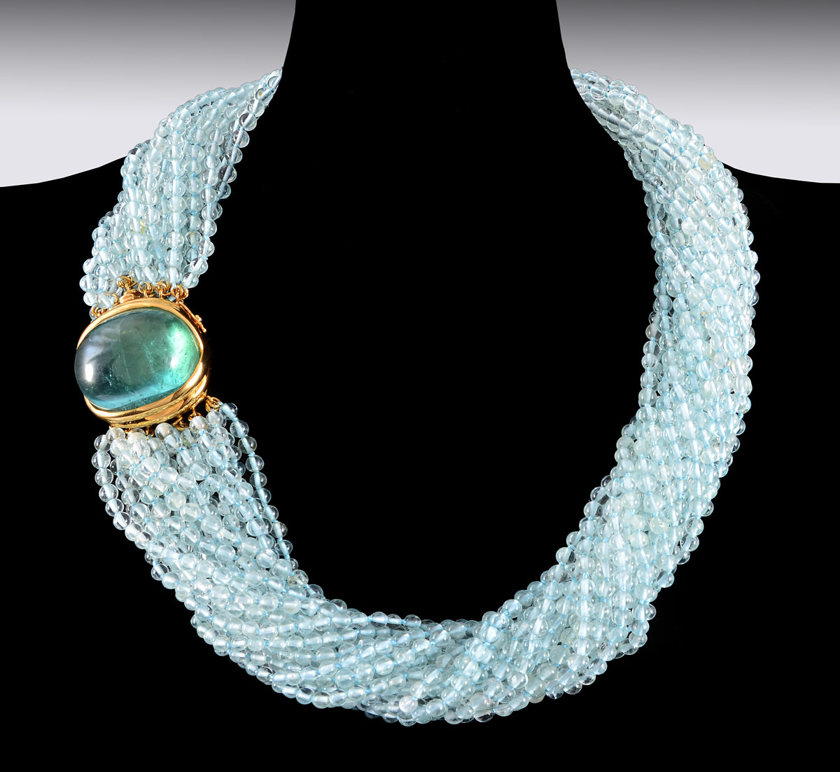 Appraisal: STRAND AQUAMARINE TORSADE NECKLACE Stunning K yellow gold mounted necklace