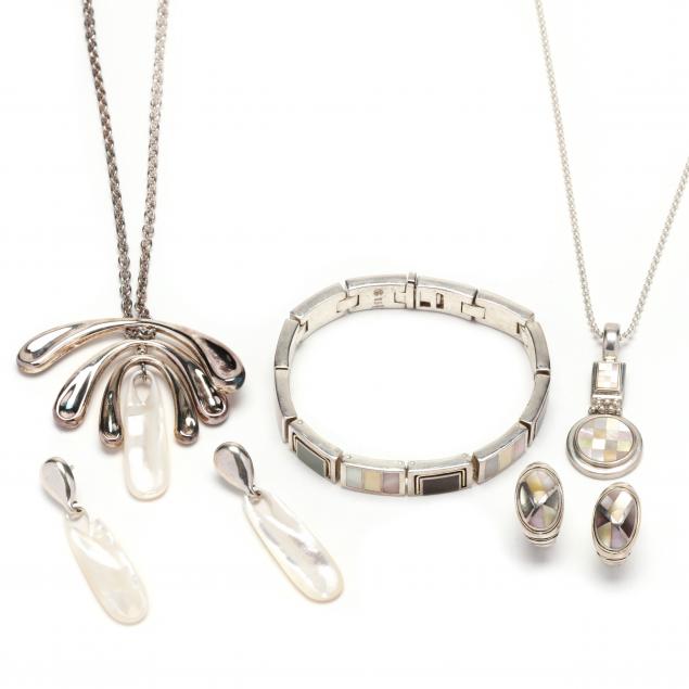 Appraisal: SILVER AND SHELL JEWELRY To include a pendant with rotating