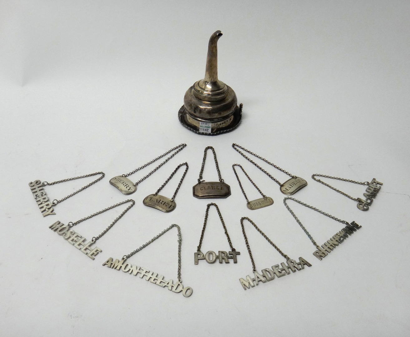 Appraisal: A silver wine funnel decorated with a gadrooned rim the