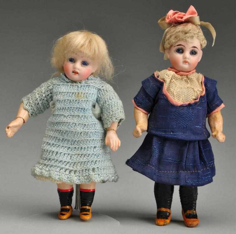 Appraisal: Lot of German Bisque Girl Dolls Description One with Rare