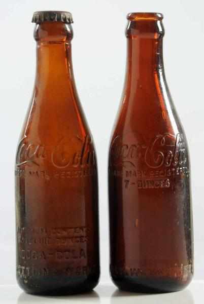 Appraisal: Lot of Amber Coca-Cola Straight-Sided Bottles Fort Wayne IN Moderate