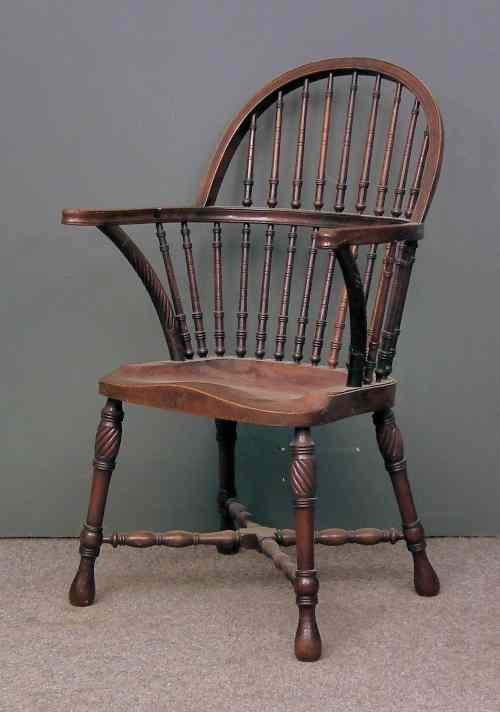 Appraisal: A th Century American mahogany stick back Windsor armchair with