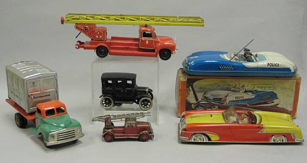 Appraisal: German Toy Cars A s Orbor clockwork automobile a CKO