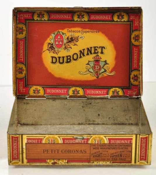 Appraisal: Dubonnet De Luxe Cigar Tin Description Square corner cigar tin