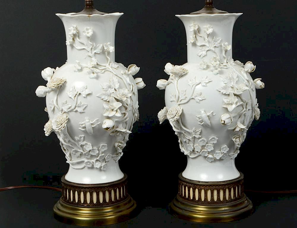 Appraisal: PAIR OF BLANC-DE-CHINE PORCELAIN LAMPS th Century Probably Chinese Each