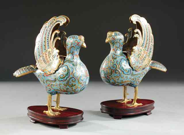 Appraisal: PAIR CHINESE CLOISONNE ENAMEL AND CHAMPLEVE STYLIZED BIRDS with removable