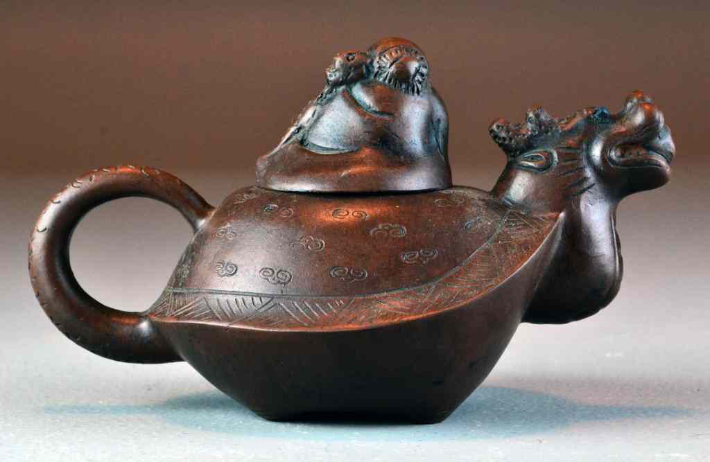 Appraisal: Chinese Yixing Pottery Tea PotThe finial depicting a seated elder