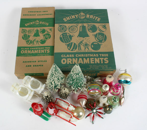 Appraisal: Vintage Christmas decorations two boxes Shiny Brite ornaments plastic sleighs