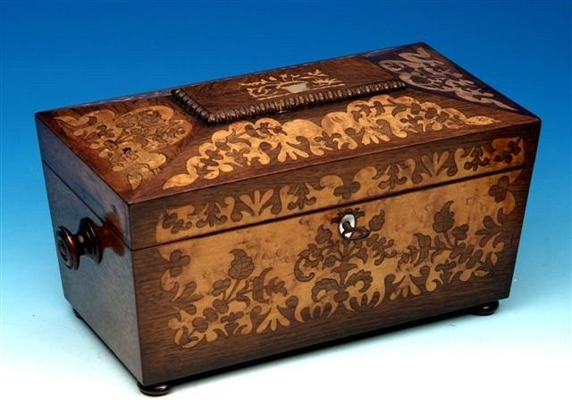 Appraisal: A Regency rosewood and birds eye maple inlaid tea caddy