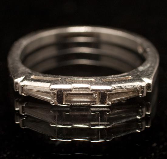 Appraisal: Lady's platinum and diamond ring guard size