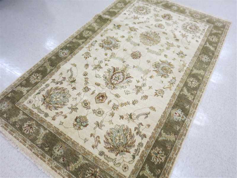 Appraisal: HAND KNOTTED ORIENTAL CARPET Indo-Persian floral and floral arabesque decoration