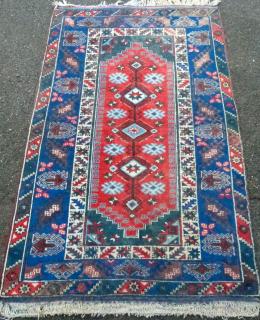 Appraisal: Persian type blue ground rug with stepped medallion cm x