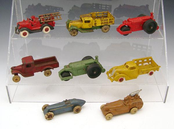 Appraisal: HUBLEY ARCADE BARCLAY CAST IRON TOY CARS Includes Hubley Hercules