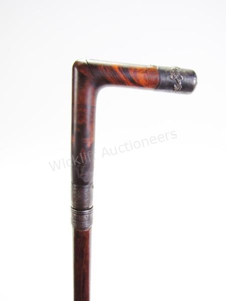 Appraisal: Silver Accented Gun Sword Cane metal shaft with wood overlay