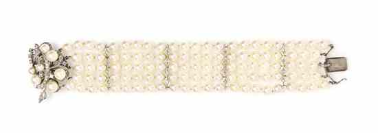 Appraisal: A Five Strand Cultured Pearl and Diamond Bracelet with Intricate