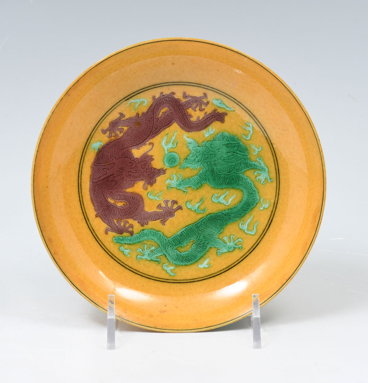 Appraisal: YELLOW FAMILLE ROSE XUANTONG - DRAGON BOWL Imperial yellow ground